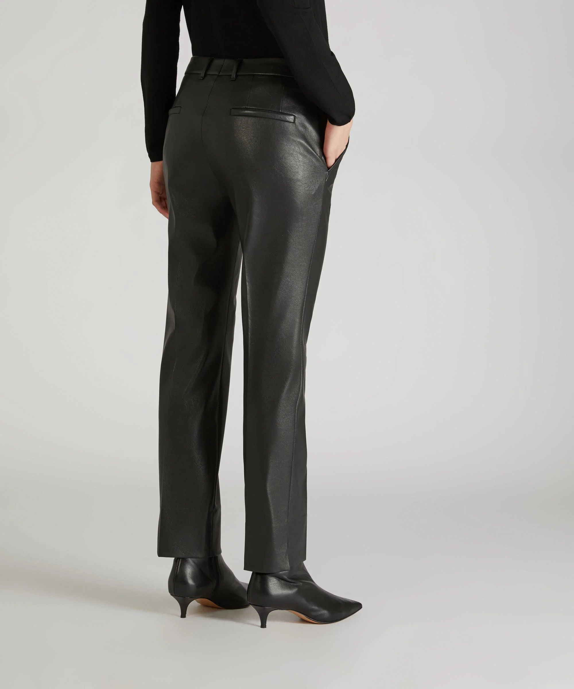 Slim-fit trousers in stretch faux leather - Image 3
