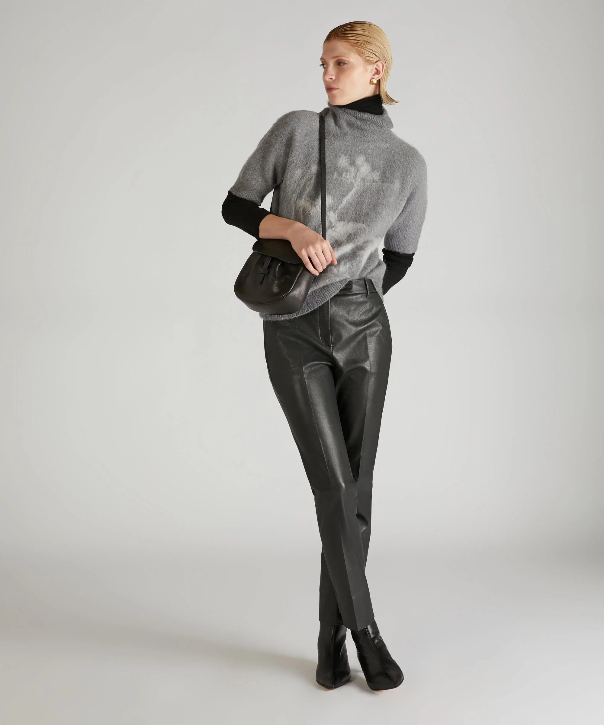 Slim-fit trousers in stretch faux leather - Image 5