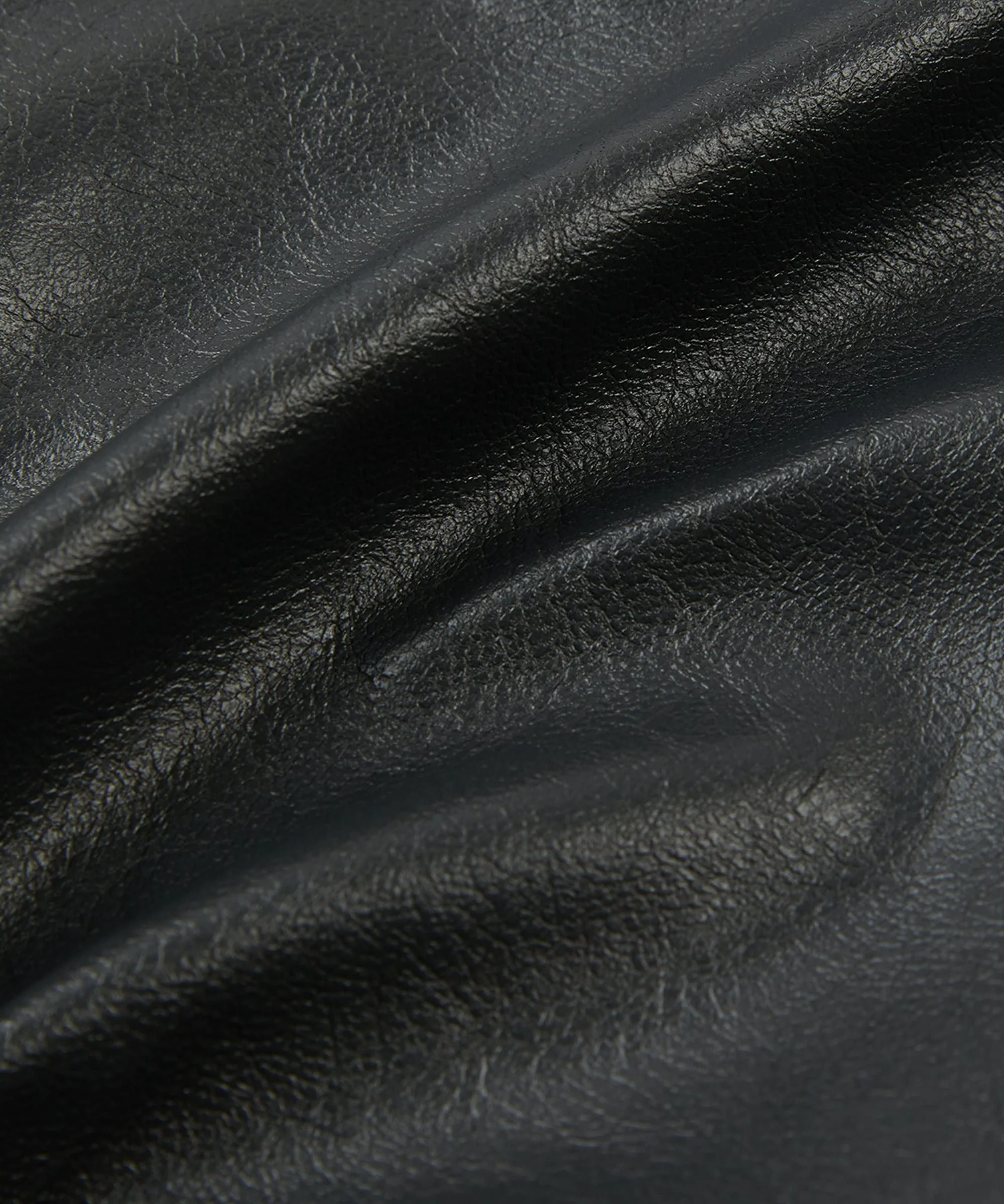 Slim-fit trousers in stretch faux leather - Image 8