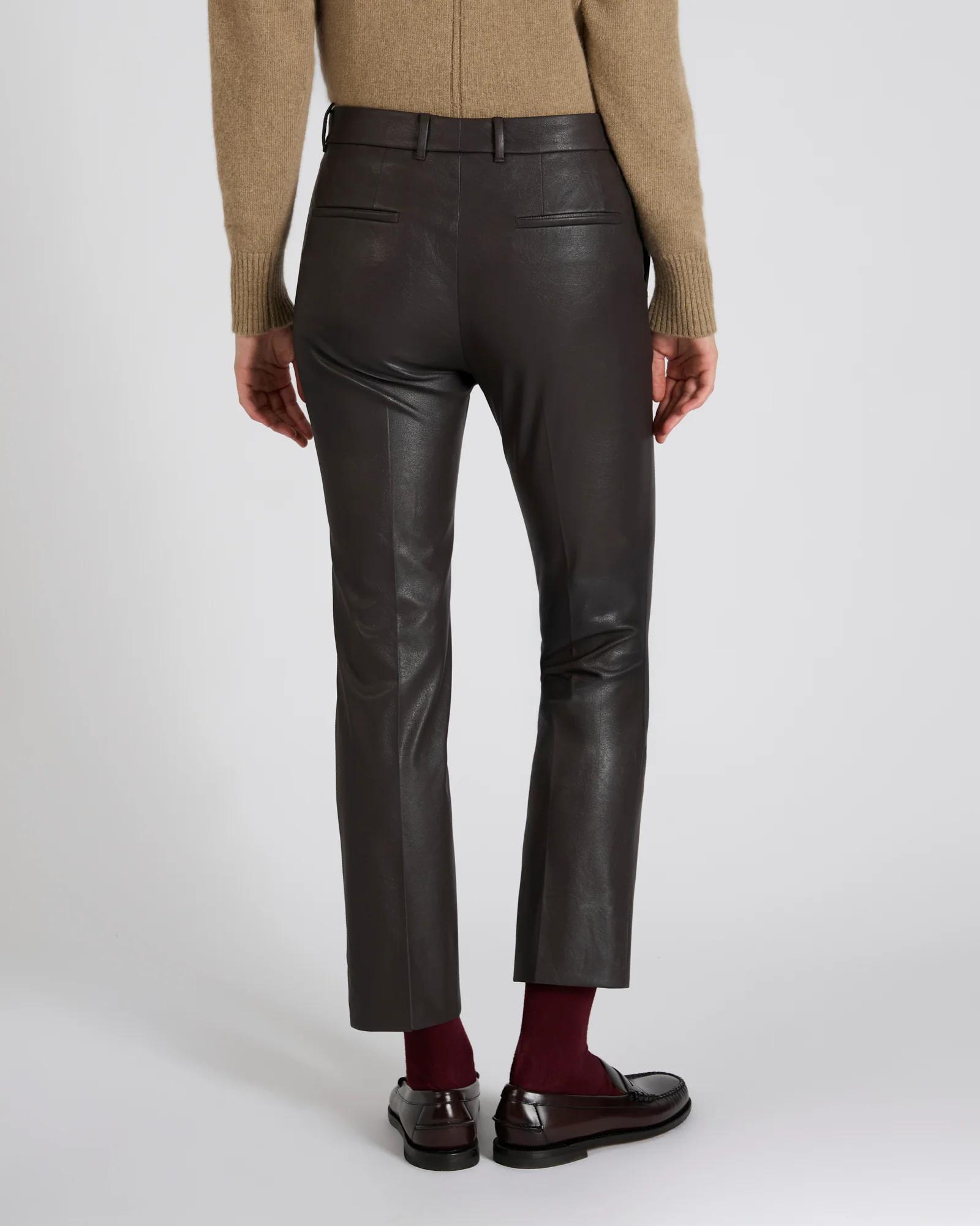 Slim fit trousers in stretch faux leather - Image 3