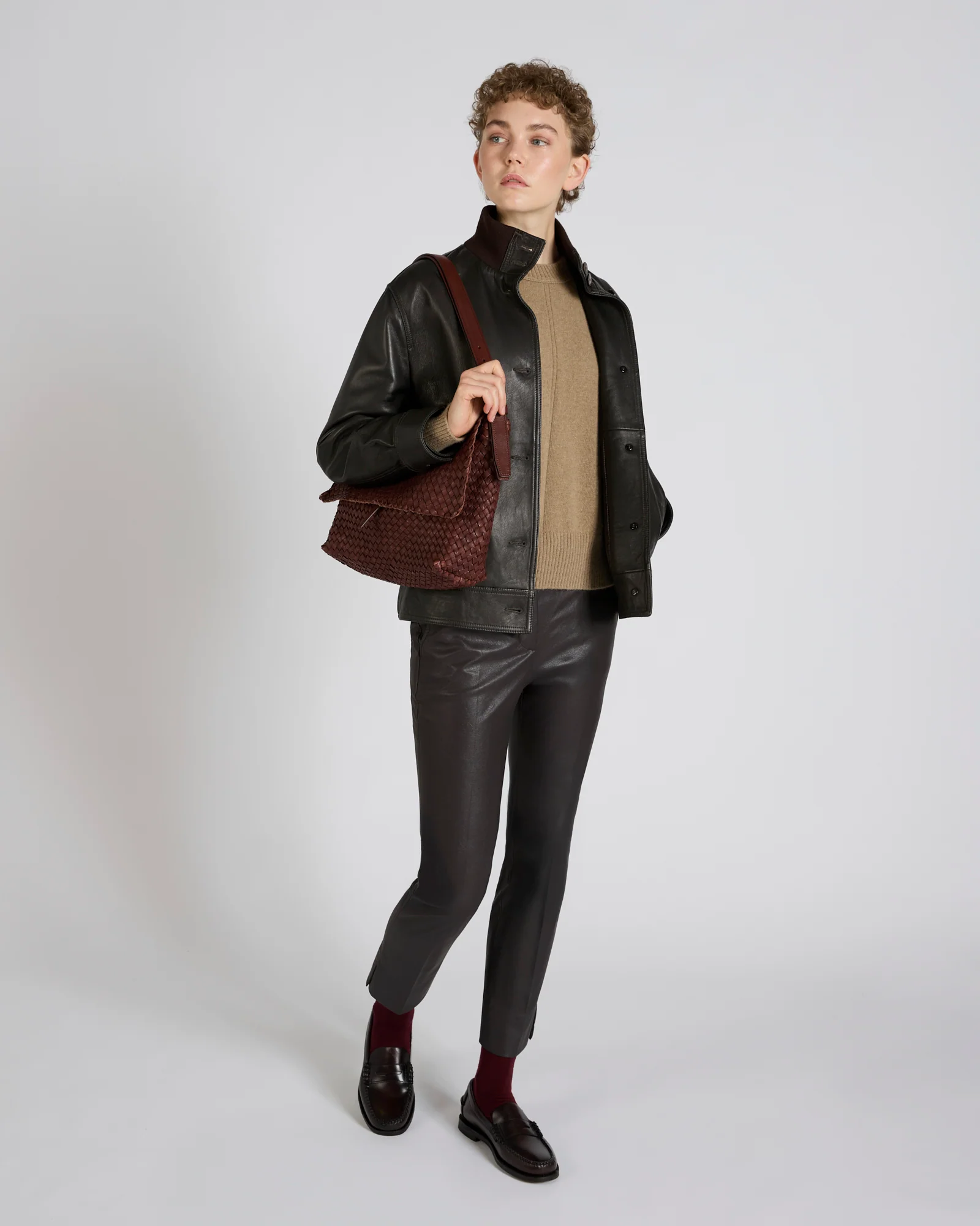 Slim fit trousers in stretch faux leather - Image 5